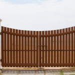 Wooden gate built with Building Products Plus material and hardware.