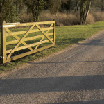 Country lane gate fence customly built by Building Products Plus.