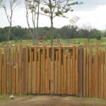 Building Products Plus poles and pilings installed on fence.