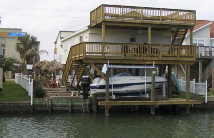 Wooden boat dock built with treated lumber