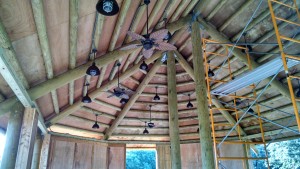 Lumber ceiling with lights and fan