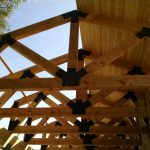 Timber trusses for building exterior in Lender, Tx.