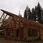 Side view of timber trusses at in construction veterinarian clinic.